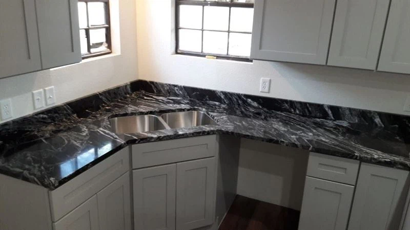 Black Forest Granite With White Cabinets