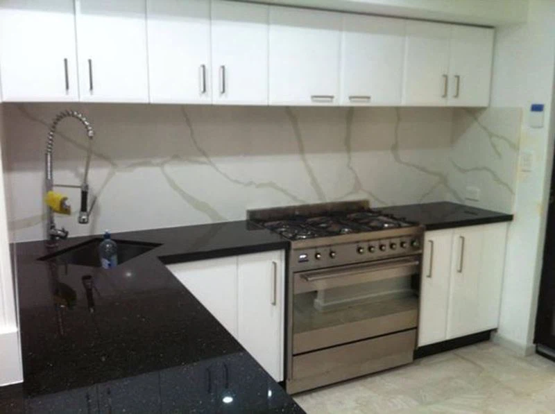 Black Galaxy Granite Countertops With Backsplash